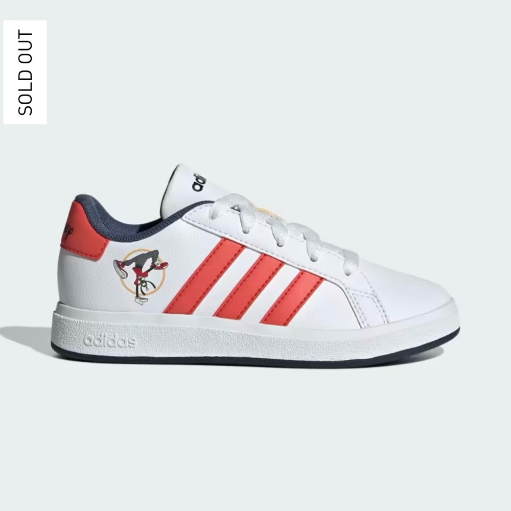 Adidas Disney big kid size 6 ( fits woman size 7)